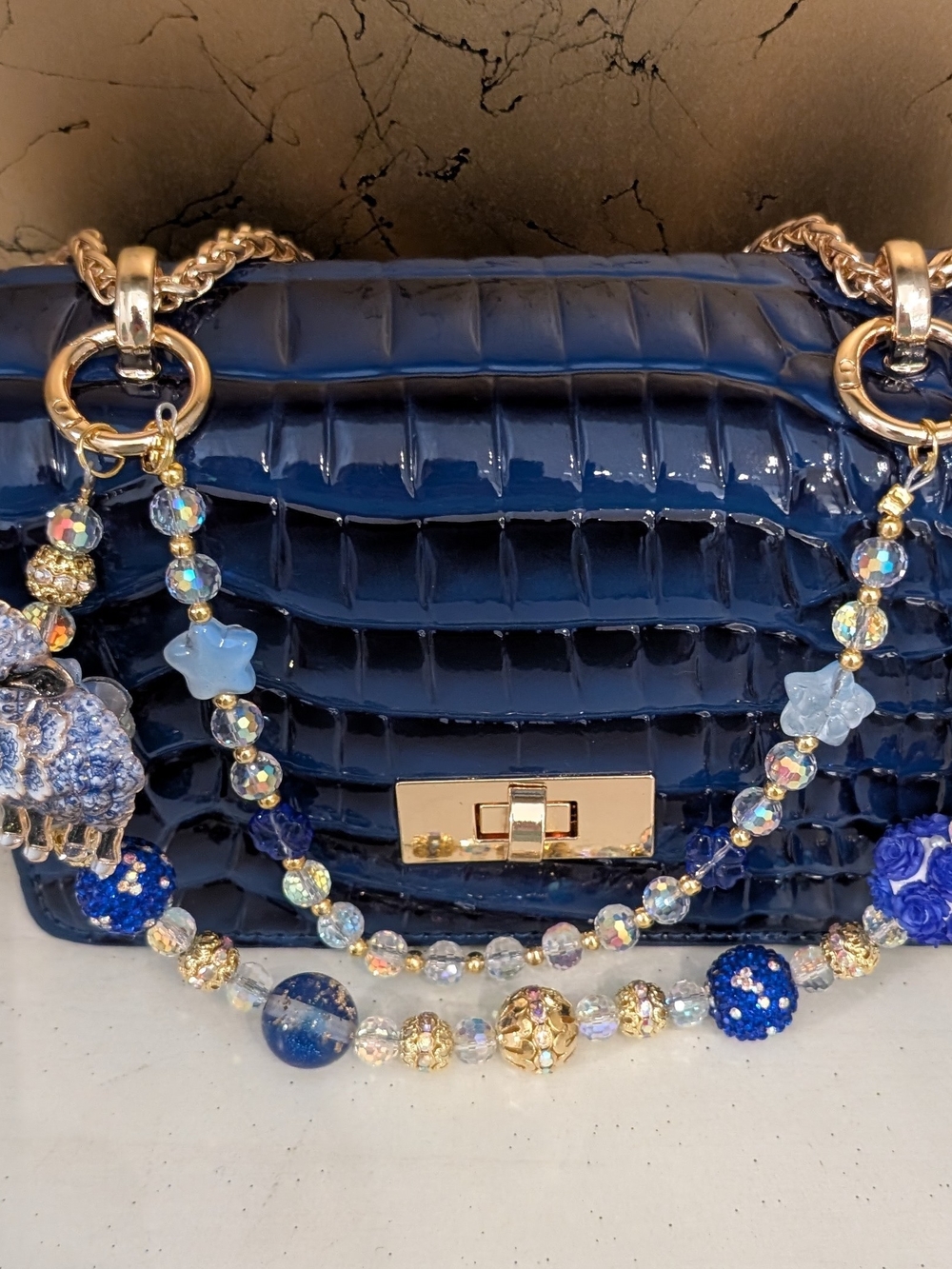 Croc-Embossed Navy Shoulder Bag with Beaded Charm Strap